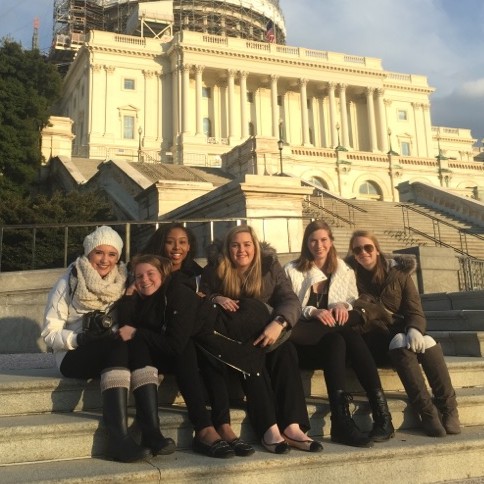 Nerinx girls sit on the steps of the Capital Building.